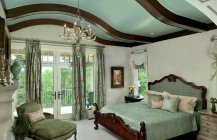 Современный дизайн спальной в бирюзовом цвете
